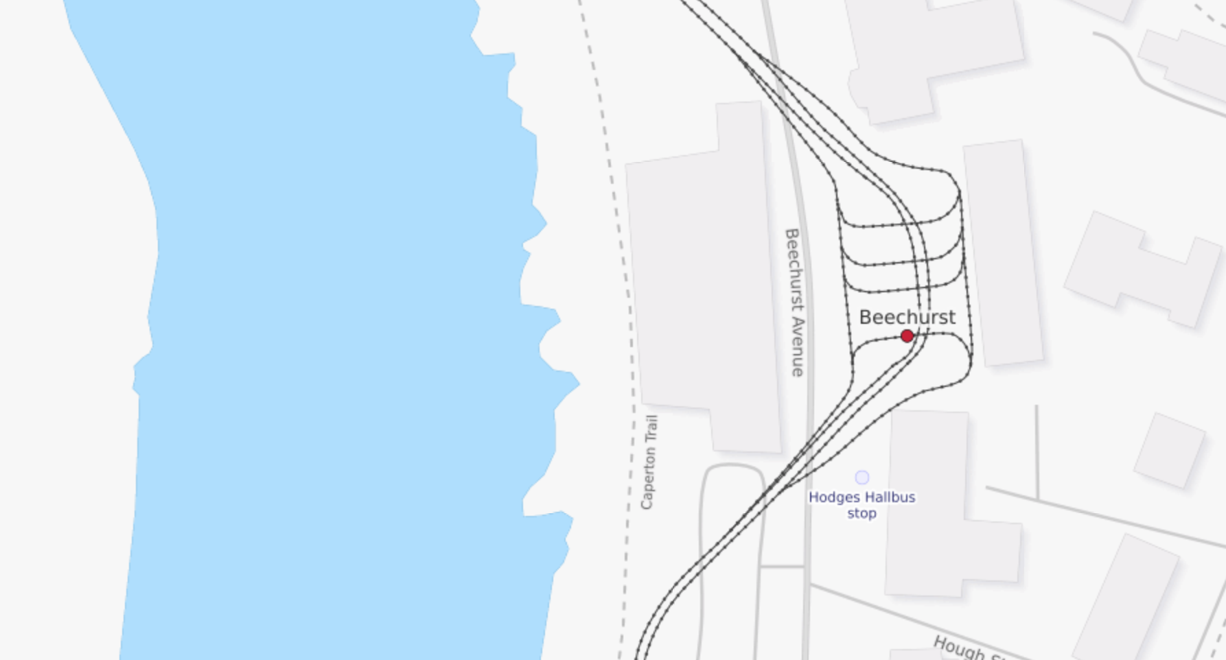 "A view of OpenStreetMap's transit layer shows the multiple track layout at the Beechurst Station, including the bypass tracks under the station."